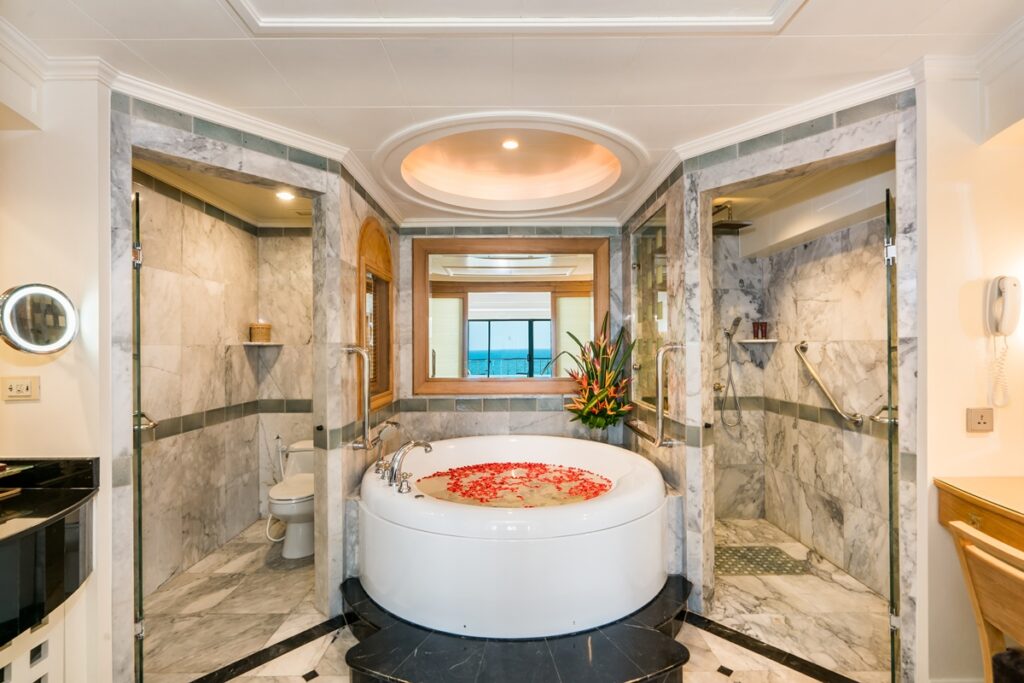 Jacuzzi with rose petals at Royal Wing Suite