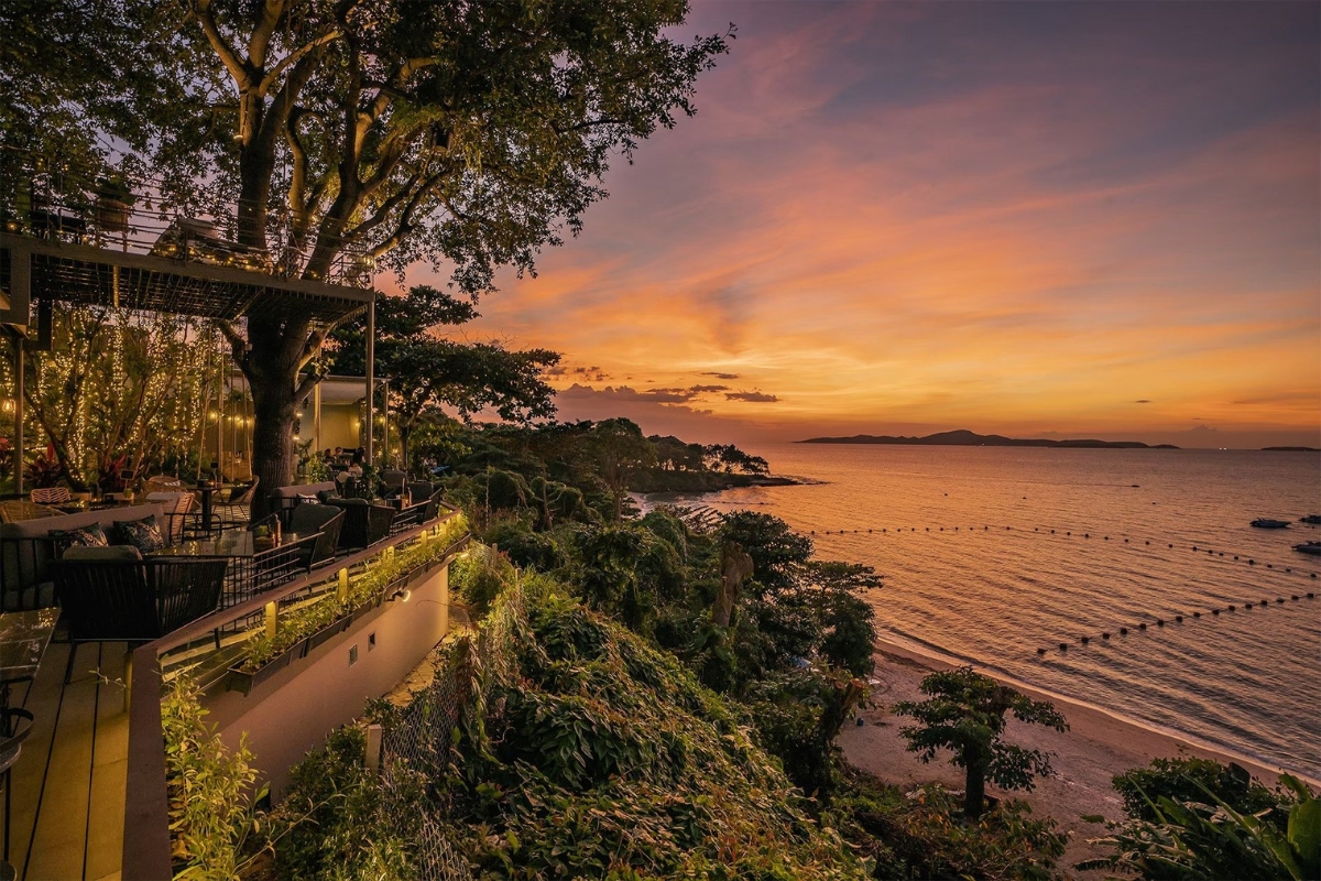 sunset view from outdoor area at forest by the sky cafe in pattaya
