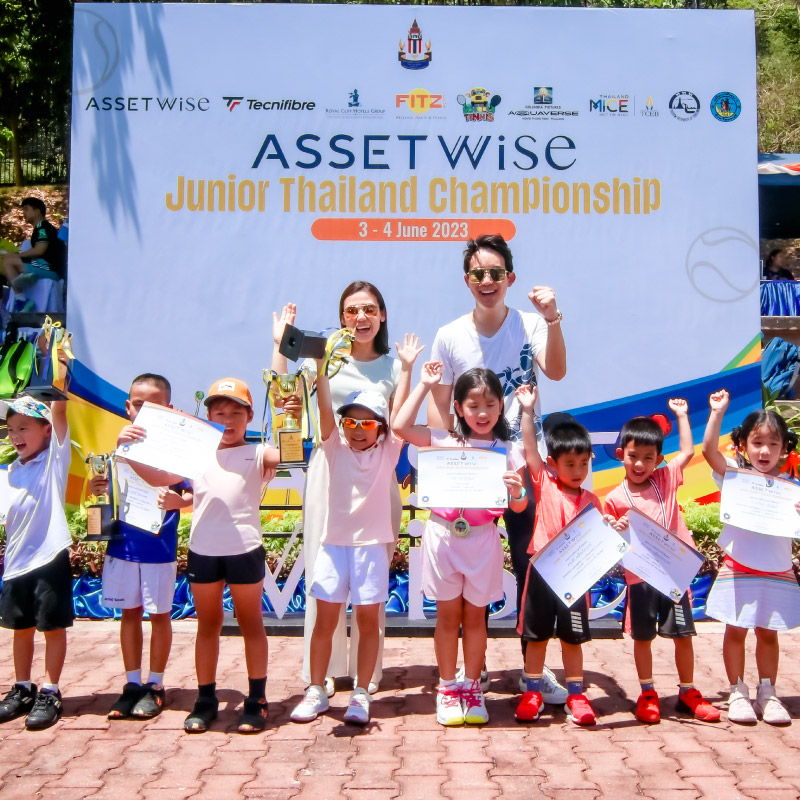 royal cliff hotels group ceo and asset wise senior vice president pose with young players at pattaya tennis championship