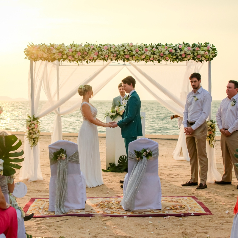 loving couple getting married on our private beach