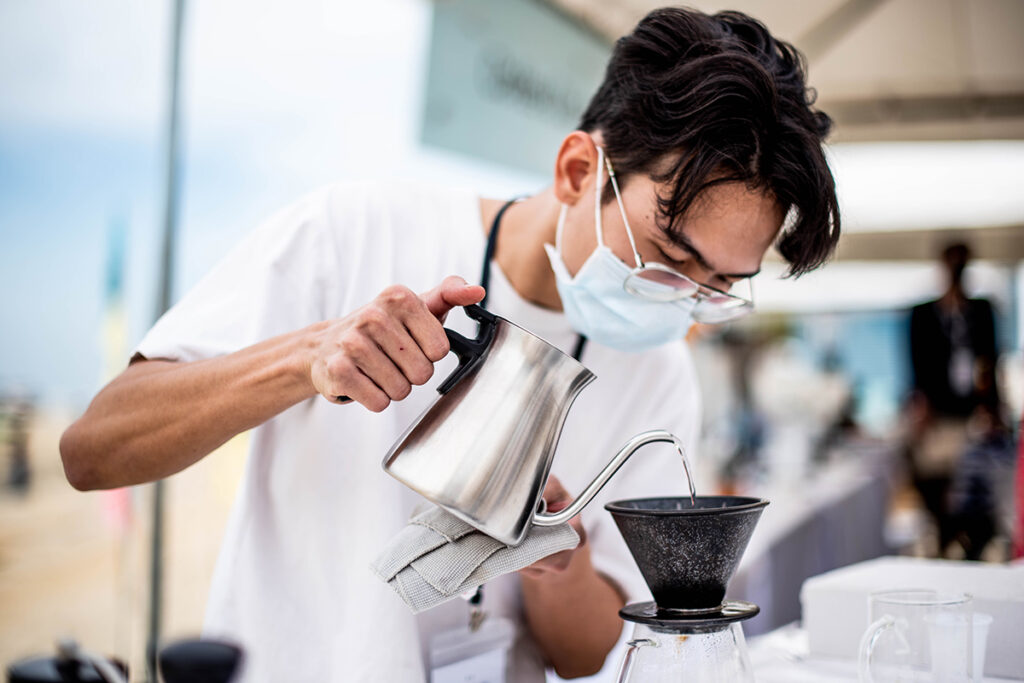 Barista making coffee at Pattaya events on the beach