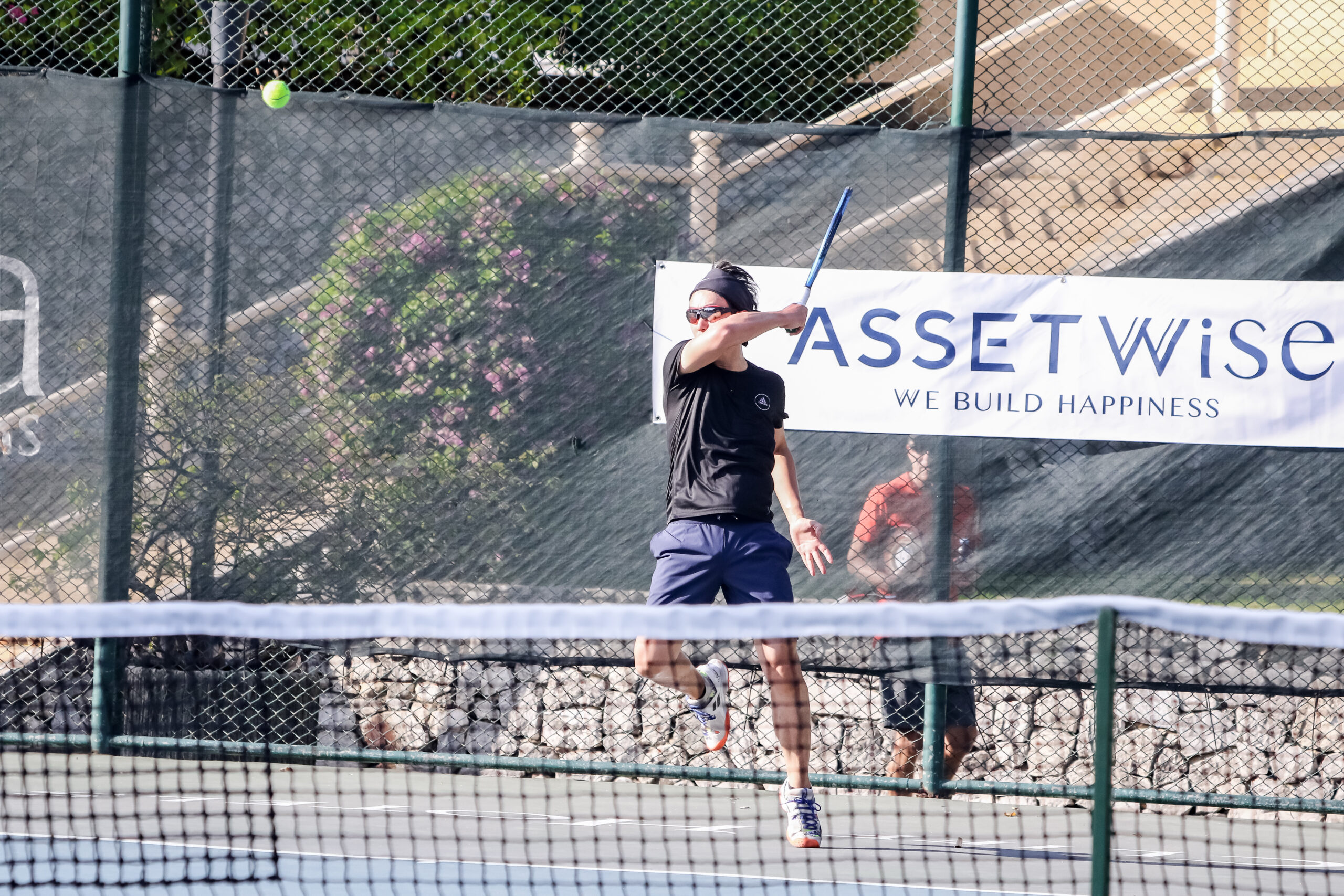 Tennis player competing at our ITF Masters Tennis Tournament.