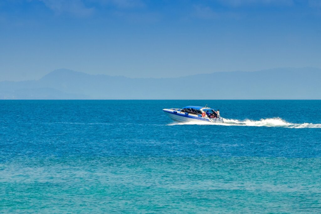 speedboat driving over water