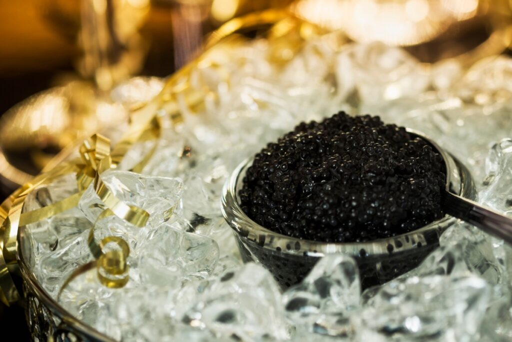 dark-colored caviar on bed of ice