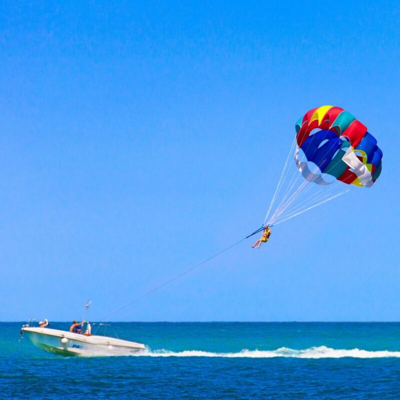 person parasailing in pattaya thailand