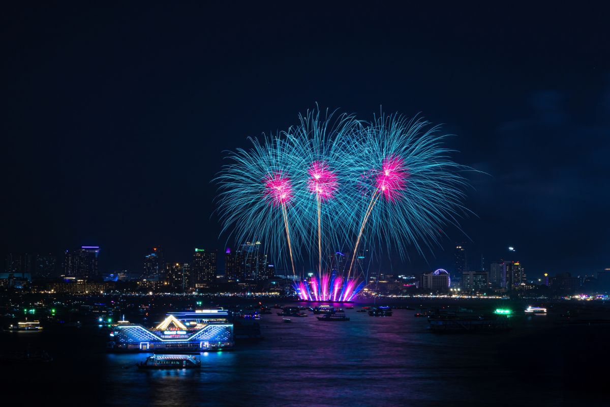 blue and pink fireworks over pattaya beach at pattaya fireworks festival 2026
